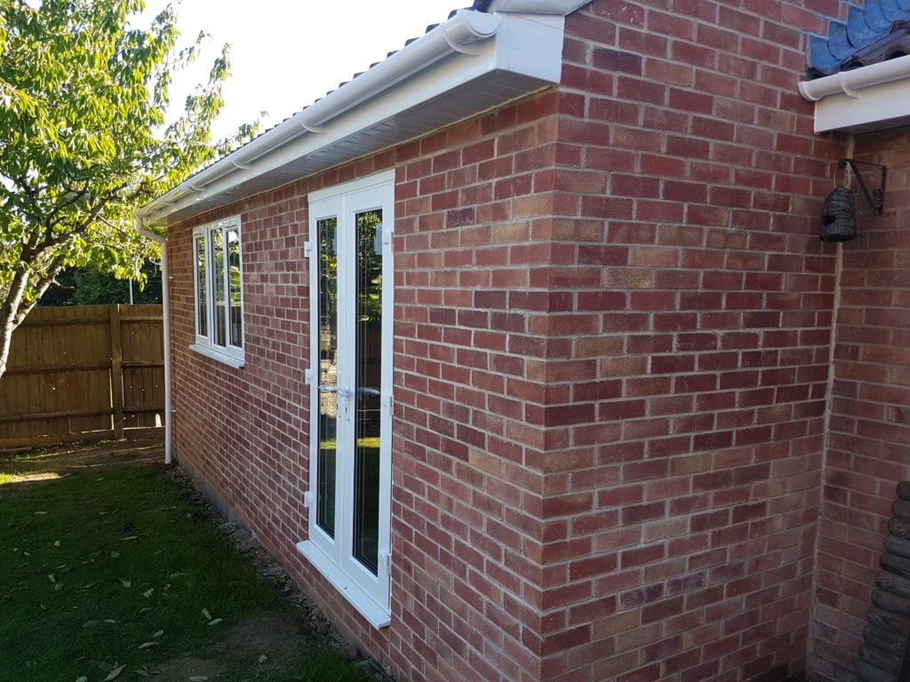 Brick house extensions with door and window. C.P. Building Contractors, Outdoor Gardening and Landscaping, Extensions, Conversions and renovations, Kitchens and Conservatories, Bricklaying, Roofing and plastering, Painting and Decorating, Block Paving, Patios, Tarmacking and Concreting in Warminster, Westbury and Trowbridge.